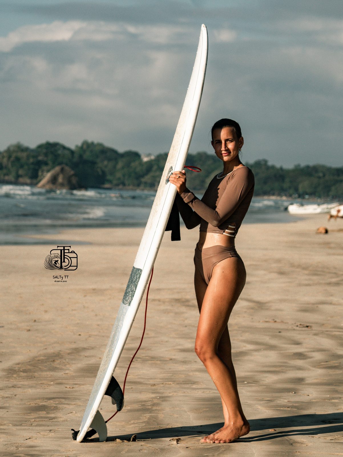 Beach portrait with a longboard